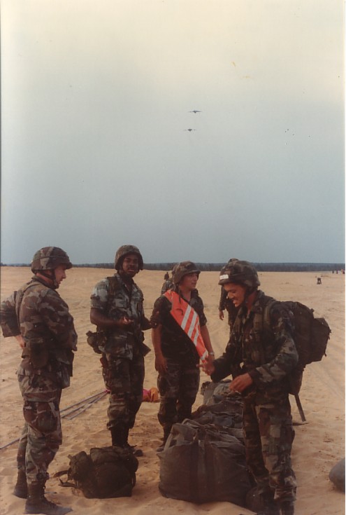 Parachute Turn-In Point, Sgt. Wilkinson on Right with White tape on Helmet